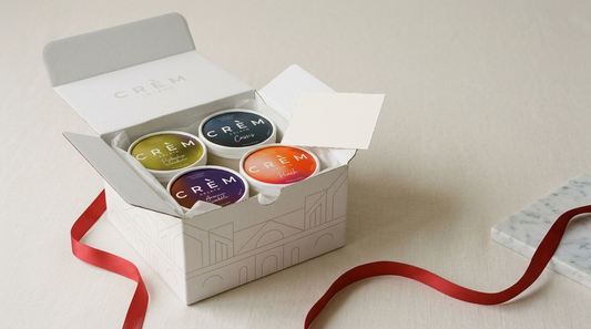 Open Crèm 4-tub gelato gift box with real CRÈM lid stickers and a printed note, for Metro Manila delivery.